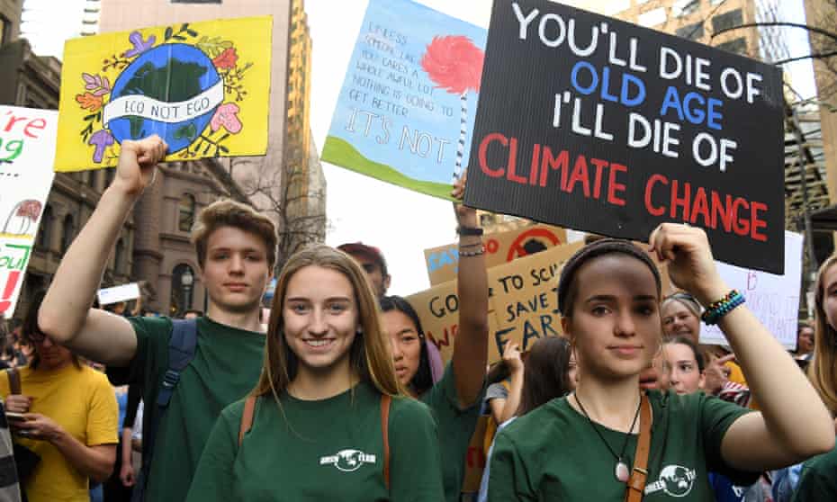 Young protesters march at a  climate rally in Melbourne. Australia