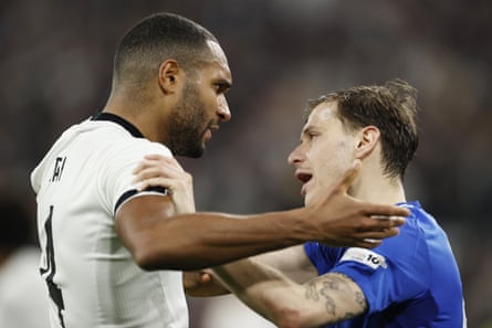 Jonathan Tah and Nicolò Barella get to grips with one another