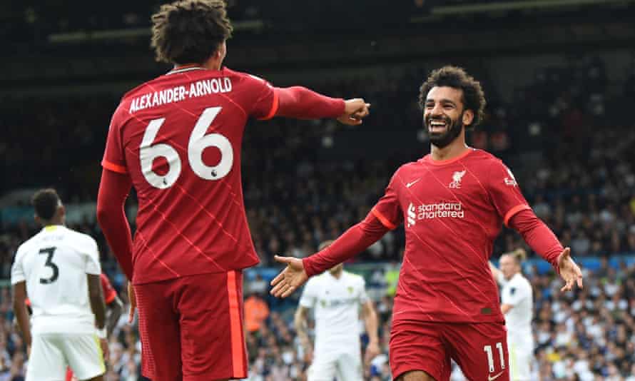 Mohamed Salah celebrates after scoring his 100th Premier League goal