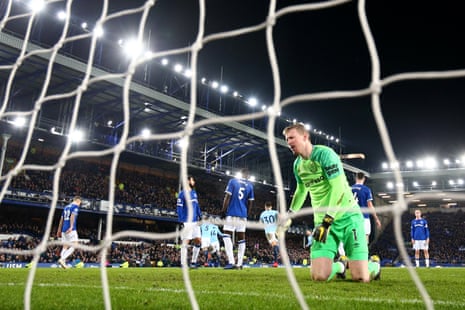 Jordan Pickford of Everton reacts after Aymeric Laporte of Manchester City scores his sides first goal