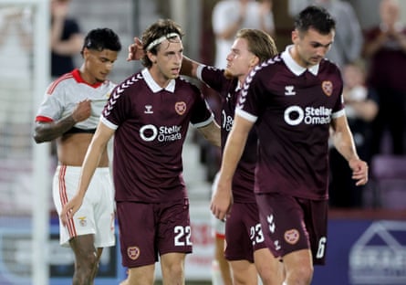 Tomas Magnusson (left) is congratulated by his teammates after scoring for Hearts against Benfica