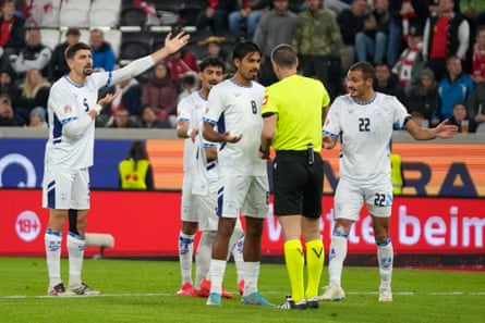 Saied Abu Farchi of Israel is sent off during defeat by Austria on Thursday