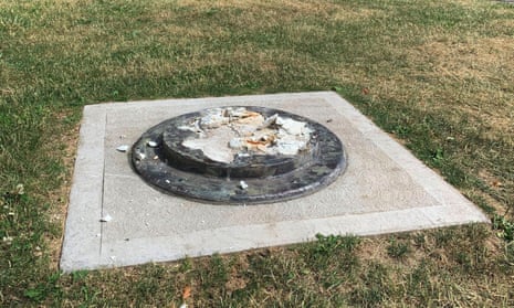 This photo provided by WROC-TV shows the remnants of a Frederick Douglass statue ripped from its base at a park in Rochester, New York Sunday.