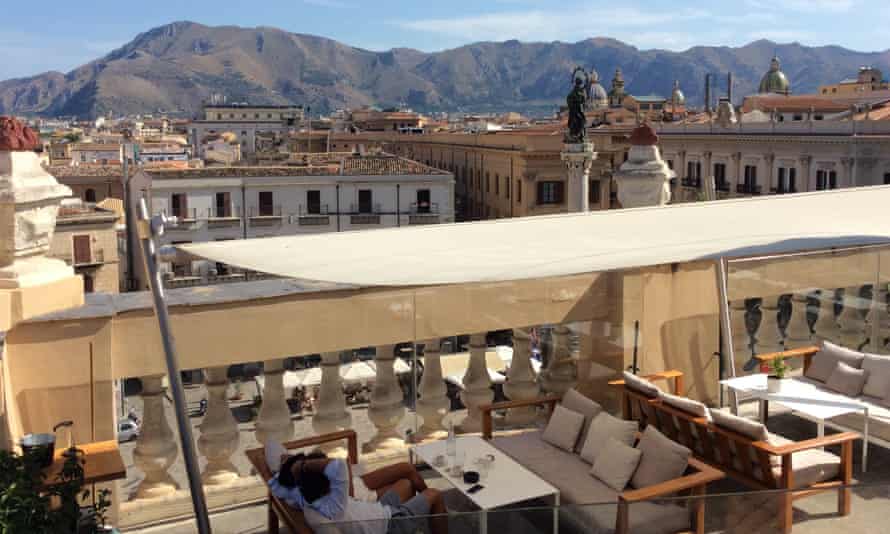 Cocktails in central Palermo with mountain views