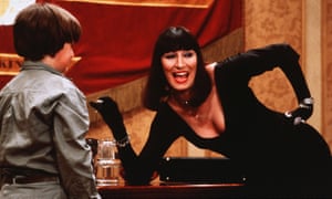 Huston gives a ferocious performance as the Grand High Witch.