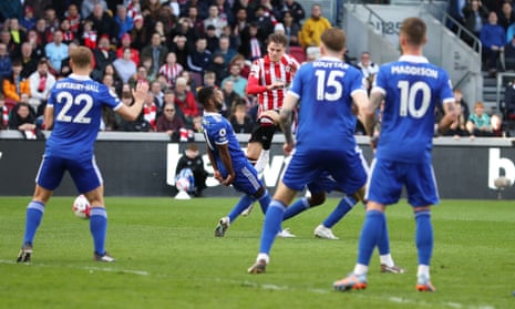 Mathias Jensen of Brentford shoots and scores his side’s first goal, via a deflection, in the 32nd minute to make it 1-0.