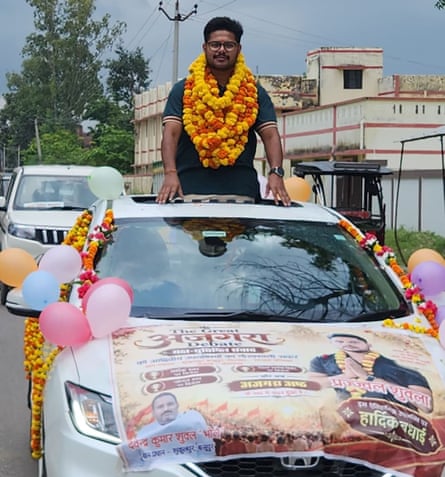 Prajjwal Shukla is driven around Ajgara in an open-top car.