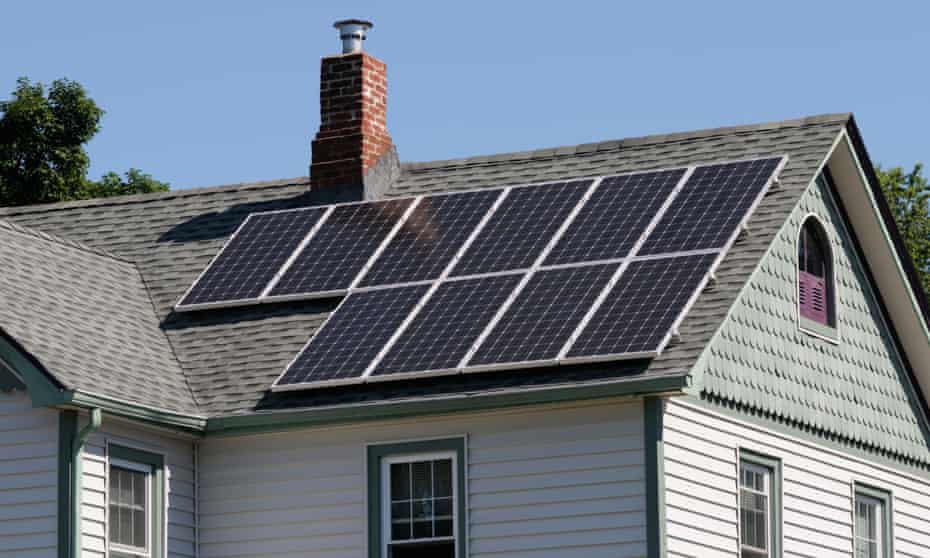 Photovoltaic solar panels on roof of house in the US.