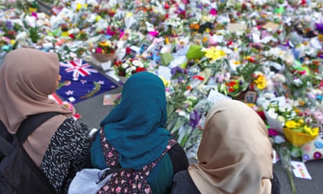 A group of women pay tribute to the victims of the mosque attacks at botanic garden memorial, in Christchurch, New Zealand, in March 2019.