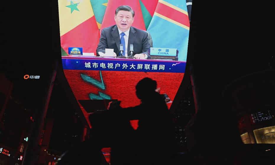 Chinese president Xi Jinping on a news program screen in Beijing