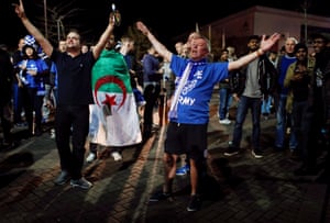 Leicester City fans celebrate outside the King Power stadium