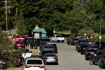 Law enforcement officers gather at Cherry Hill Park.