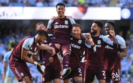 Ollie Watkins is held aloft by his Aston Villa teammates