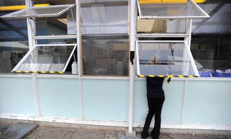 Hazard tape on a set of school windows – but the wider condition of school buildings in England is being kept under wraps.