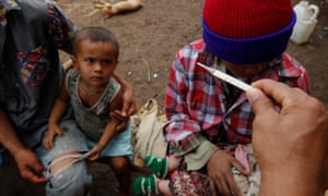 Khmer families in Andong Thma participate in a malaria screening initiative