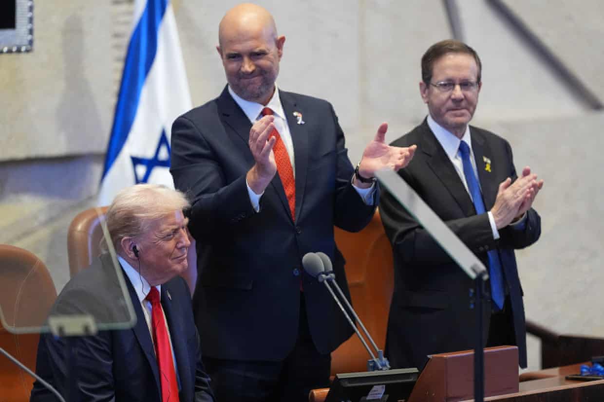 Amir Ohana (centre) applauding Donald Trump alongside Isaac Herzog (right) before the US president spoke in the Knesset in October 2025.