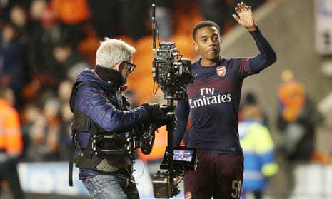 Joe Willock waves to the celebrating Arsenal fans after the final whistle.