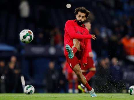 Mo Salah takes aim during the warm up.