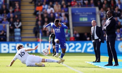 Patson Daka of Leicester City skips over the challenge of Crystal Palace’s Joachim Andersen.