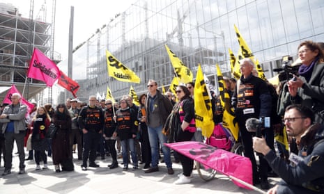 French union members demonstrate at the start of the trial in Paris in May 2019