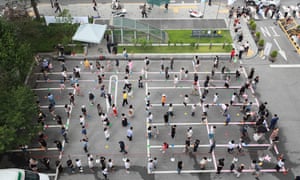 The queue for a coronavirus testing station in Seoul yesterday.