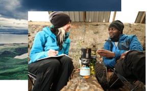 ‘We wish to change the mindset in the case of the outside’: the duo breaking down obstacles within the journey world | Drink exterior the field 4 Phoebe Smith and Dwayne Fields cook on a camping stove