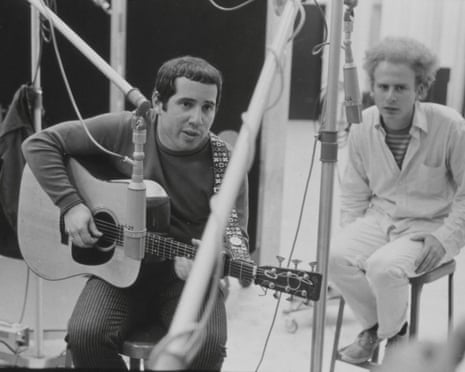 Two different types of bad hair … Paul Simon and Art Garfunkel in the studio.