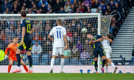 Lawrence Shankland scores with a header against Finland at Hampden Park.