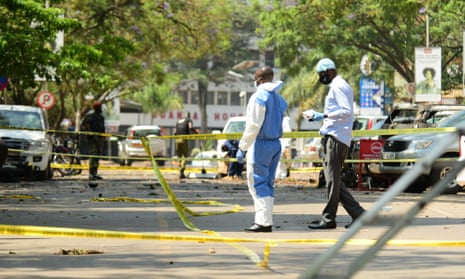 Police killed five people as investigators carry out inspections at the scene of a bomb blast in Parliamentary Avenue, Kampala.