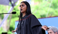 Woman in university gown gives speech