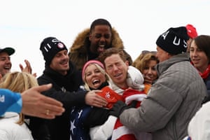 Gold medalist Shaun White of the United States celebrates during the victory ceremony for the snowboard men’s halfpipe final.
