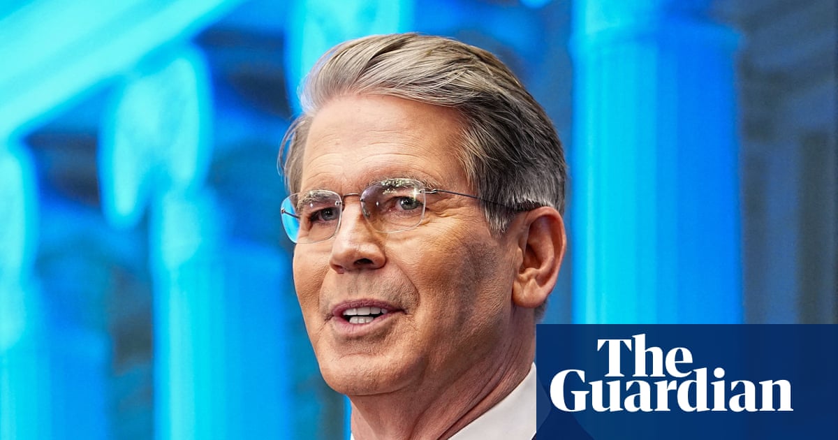 Mathias Cormann and Scott Bessent smile for the cameras after agreeing that everyone will fight tax havens—except the companies that actually use them.