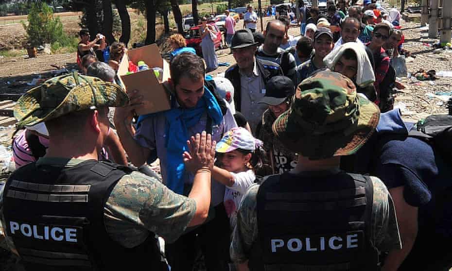 Migrants waiting at the border between Macedonia and Greece