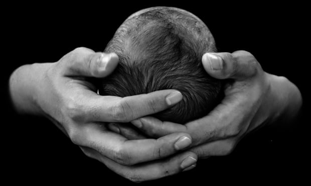 Father Holding Baby Girl