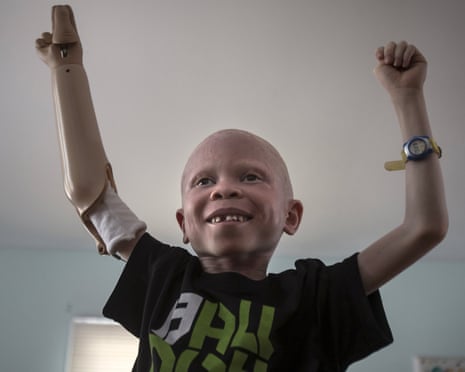 Baraka Cosmas from Tanzania dances along as a video plays on a computer in the Staten Island borough of New York