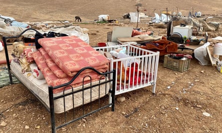 The belongings of 73 people who were forcibly displaced by Israeli forces stand in the Jordan Valley in the occupied West Bank.