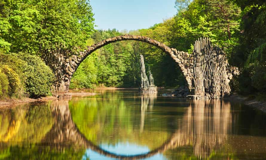 The reflection of the Rakotzbrücke creates a perfect circle.