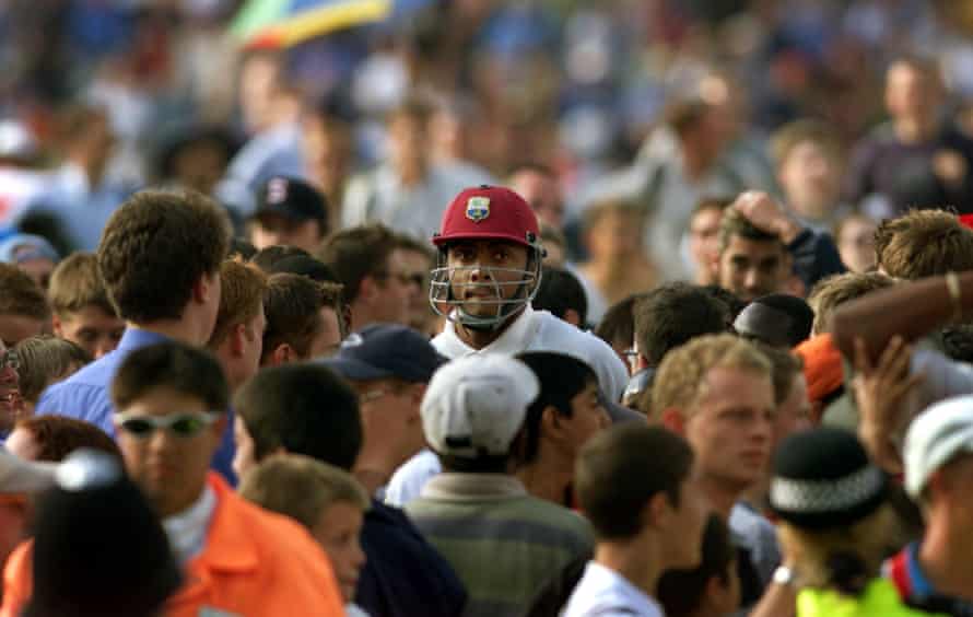 Courtney Walsh (centre) walks through the crowds after the West Indies were bowled out against England in the Fifth Test at the Oval in London on 4 September 2000. Walsh has said he may retire from international cricket. England won the test and the five-match series 3-1 breaking the longest running losing streak in test cricket.