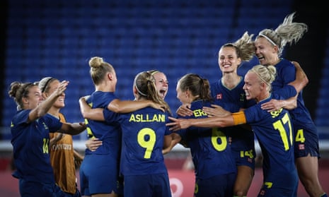 The Sweden women’s football team celebrate after reaching the Olympic final which has been moved because of heat concerns.