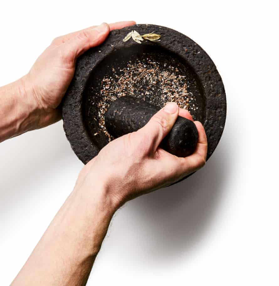 Felicity Cloake’s perfect cardamom buns – step 1a: Grind the cardamom seeds relatively finely in a mortar or spice grinder; a few coarser bits are no bad thing.