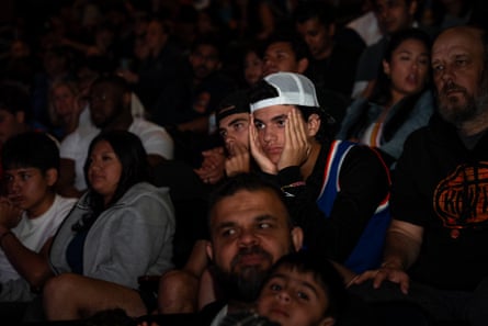 New York fans watch the game as the Knicks fall further behind the Indiana Pacers during the second quarter on Saturday at a watch party held at Madison Square Garden.