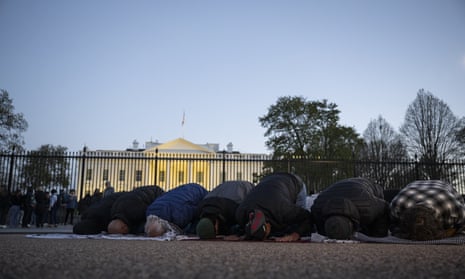 People in prayer outside the White House following an iftar event in solidarity with Gaza.