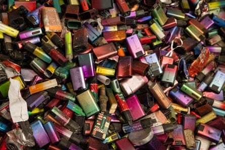 A pile of colourful, used disposable vapes