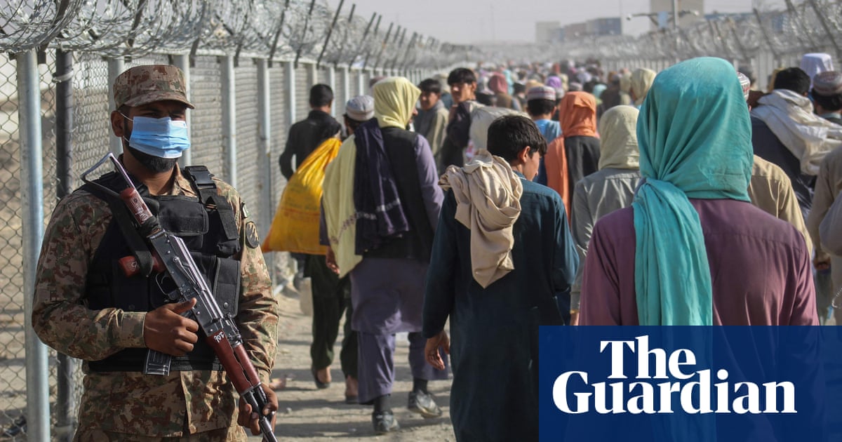 ‘Everyone is afraid’: Afghans fleeing Taliban push for exit into Pakistan