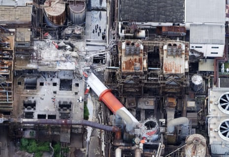 A collapsed chimney at Nippon Paper Industries factory.