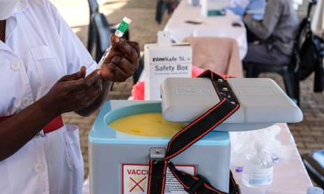 A health worker prepares Covid-19 vaccine, Kampala, Uganda, May 2021