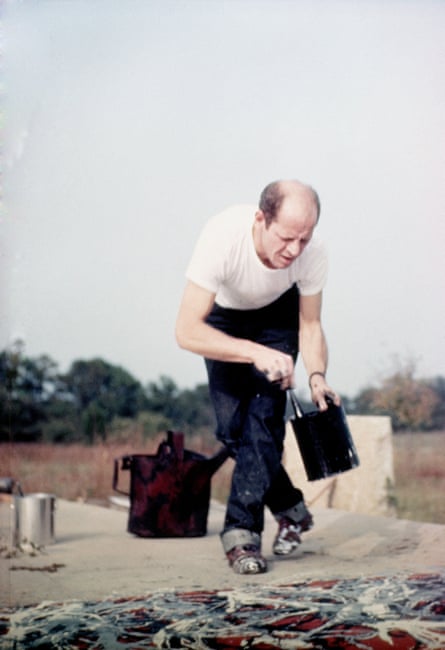 Jackson Pollock at work at his studio in Long Island.