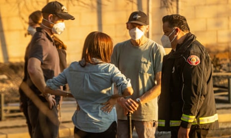People stand in masks