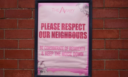 A venue sign tells patrons to respect neighbours