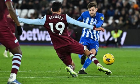 Adam Lallana launches an unsuccessful effort at goal for Brighton.